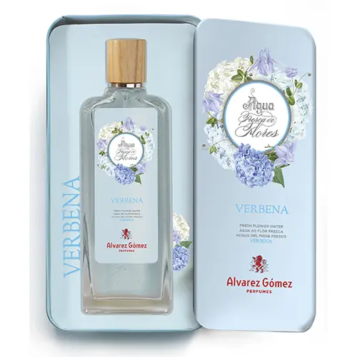 A. Gomez Verbena EDT 175ml viene en un frasco rectangular con tapón de madera y etiqueta floral, presentado en una caja de lata azul con la etiqueta "Aqua de Colonia de Flores Verbena" de Alvarez Gómez.