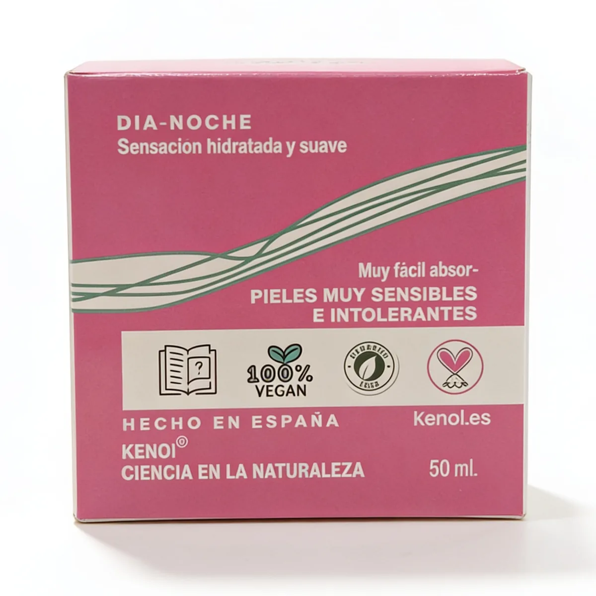 Una caja rosa con la etiqueta «Kenoi Sensitive Calm crema calmante 24H (50 ml)», adecuada para pieles muy sensibles e intolerantes, vegana, fabricada en España, con un diseño de hojas y la dirección web kenol.es.