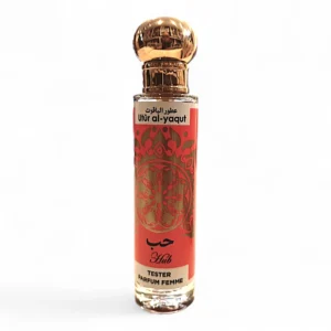 Frasco cilíndrico de perfume Utür al-yaqut Hub mujer EDP 30ml con tapón dorado y diseño rojo-naranja, etiquetado en árabe e inglés, que incluye Hub y Tester Parfum Femme.