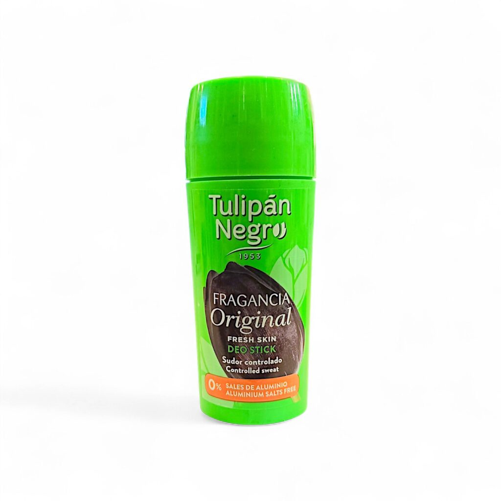 Desodorante en barra verde Tulipán Negro con la etiqueta Fragancia Original. La etiqueta indica que controla el sudor, es para pieles frescas y contiene 0% de sales de aluminio. El tapón es verde y el fondo blanco.