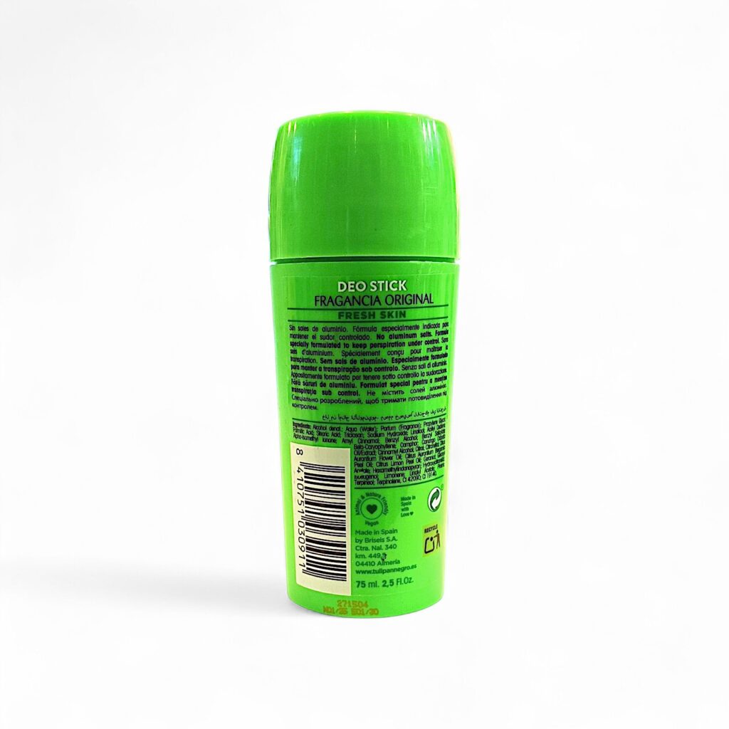 deo-stick-tulipan-negro-back Un desodorante en barra de color verde aparece de pie sobre un fondo blanco, mostrando la contraetiqueta con la información del producto, los ingredientes y los códigos de barras impresos en texto negro.