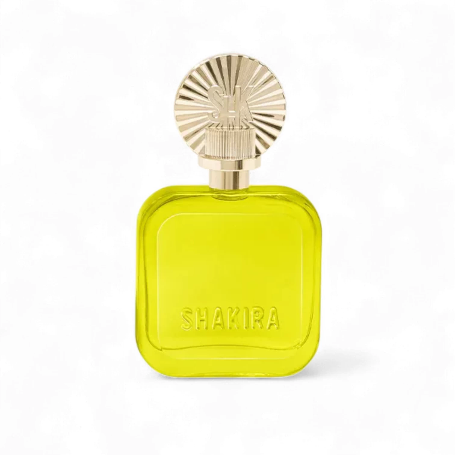 Frasco cuadrado amarillo-verde de Shakira Amarillo EDP 50ml con tapón redondo dorado y "SHAKIRA" grabado en la parte delantera sobre fondo blanco. Incluye BL 75ml.