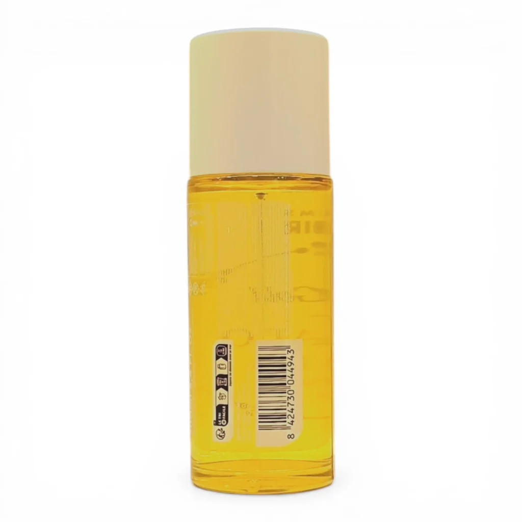 Botella de plástico transparente llena de líquido amarillo, con tapón beige y código de barras visible en la etiqueta. La botella está en posición vertical sobre un fondo blanco liso. Botella de plástico transparente llena de líquido amarillo, con tapón beige y código de barras visible en la etiqueta. La botella está en posición vertical sobre un fondo blanco liso.