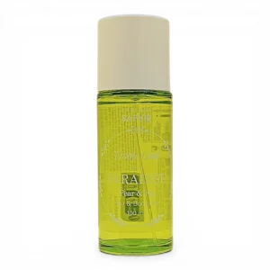 Frasco transparente de perfume Saphir Paradise Tropic Gold, lleno de líquido amarillo verdoso, con tapón blanco y etiquetado como Pear & Fig, Hair & Body Mist, 100 ml.