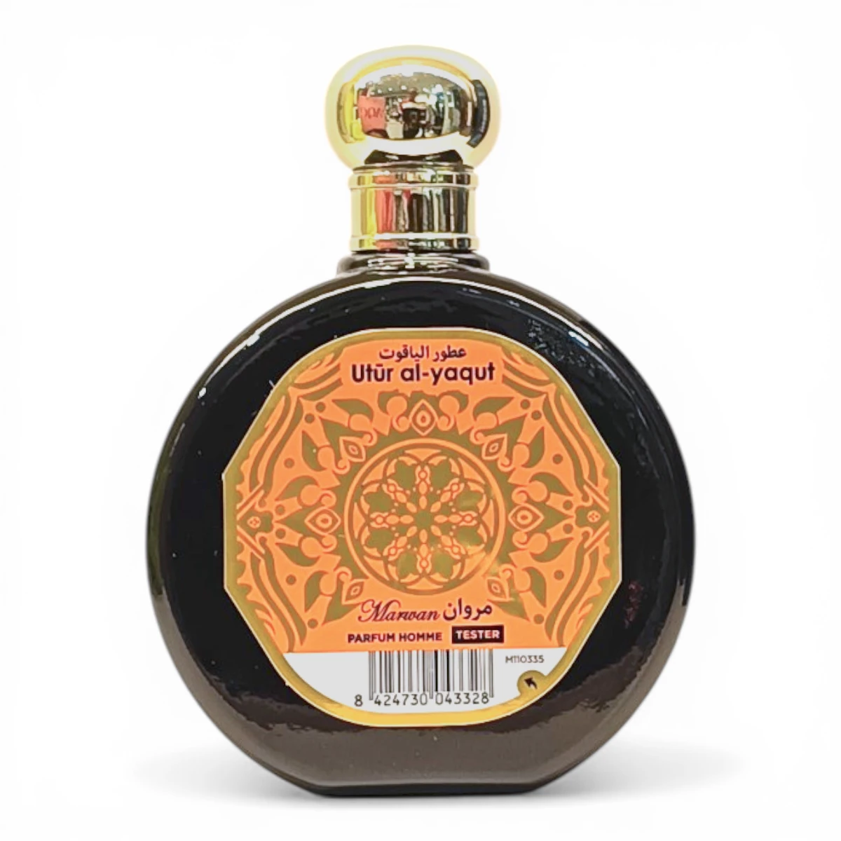Frasco redondo y oscuro de perfume Utr al-yaqut con tapón dorado y etiqueta naranja ornamentada con escritura árabe y motivos decorativos, etiquetado Maraawi Parfum Homme Tester.