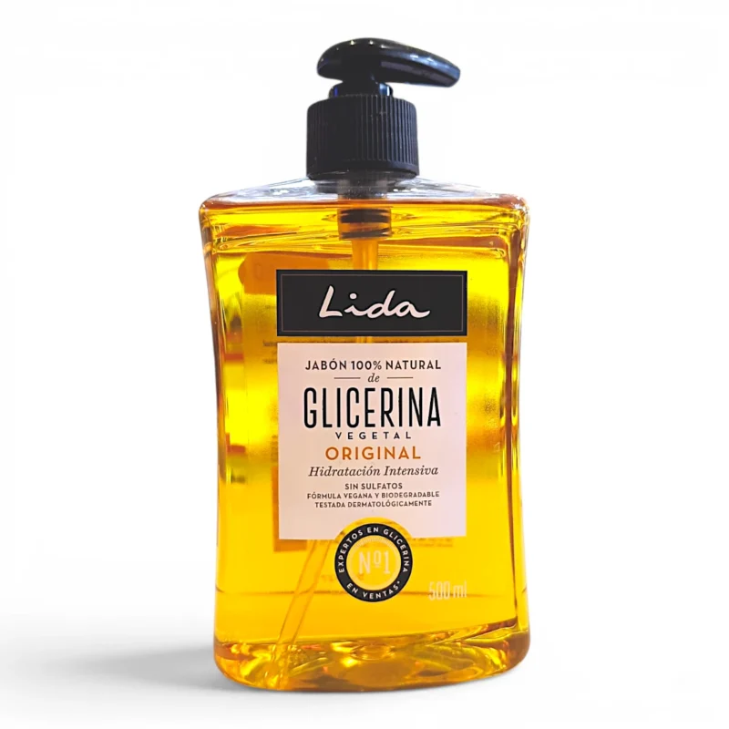 Un frasco de plástico transparente con dosificador de «Jabón 100 % natural de glicerina vegetal Lida», de 500 ml, un jabón amarillo para una hidratación intensiva, que presenta texto en español en la parte delantera.