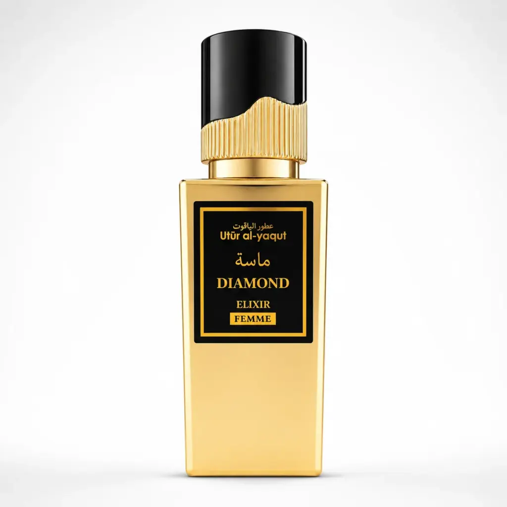Un frasco de perfume rectangular de color dorado con un tapón negro y dorado. En la etiqueta se lee «Utur al-yaqut Diamond Elixir Femme» en inglés y árabe, sobre un fondo negro con detalles dorados.