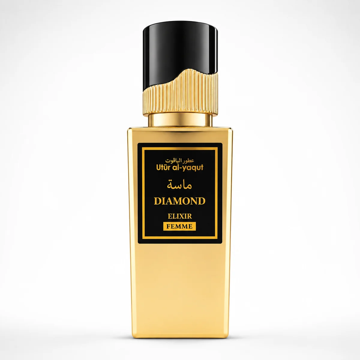 Un frasco de perfume rectangular de color dorado con un tapón negro y dorado. En la etiqueta se lee «Utur al-yaqut Diamond Elixir Femme» en inglés y árabe, sobre un fondo negro con detalles dorados.